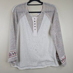 Boho Chic Knit Top with Floral Accents